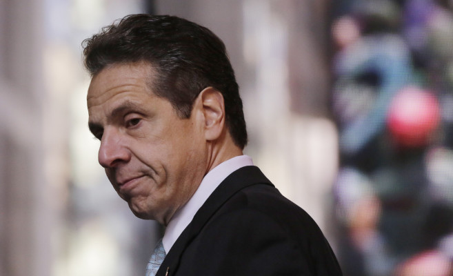 New York incumbent Democratic Gov. Andrew Cuomo looks over a crowd after giving a campaign speech in New York's Times Square, Monday, Nov. 3, 2014. He faces Republican challenger Rob Astorino in Tuesday's election. (AP Photo/Mark Lennihan)